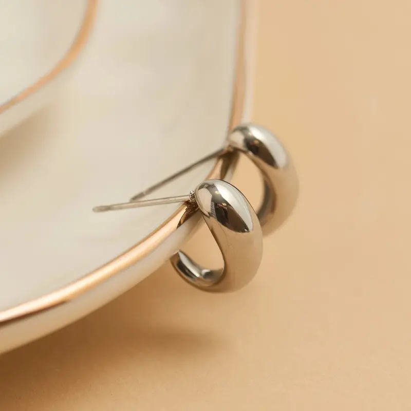 Silver Half-Loop Huggie Earrings – Sleek Curved Design